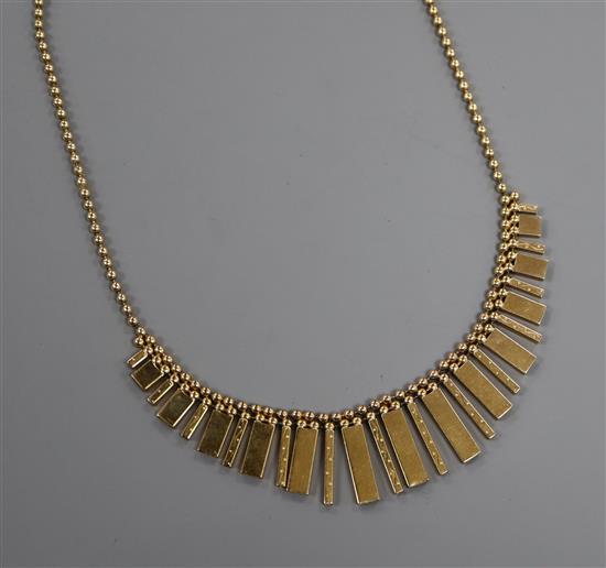 A 1980s Italian Uno-a-Erre 9ct gold fringe necklace, 14 grams.